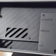 A photo of the back of the new Nintendo Switch OLED Model's dock displaying the AC adapter, HDMI output, and LAN ports.
